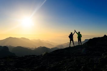 Mountain Skyline with People Silhouette