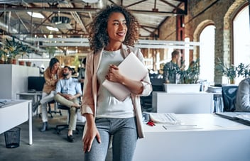 Woman carrying laptop