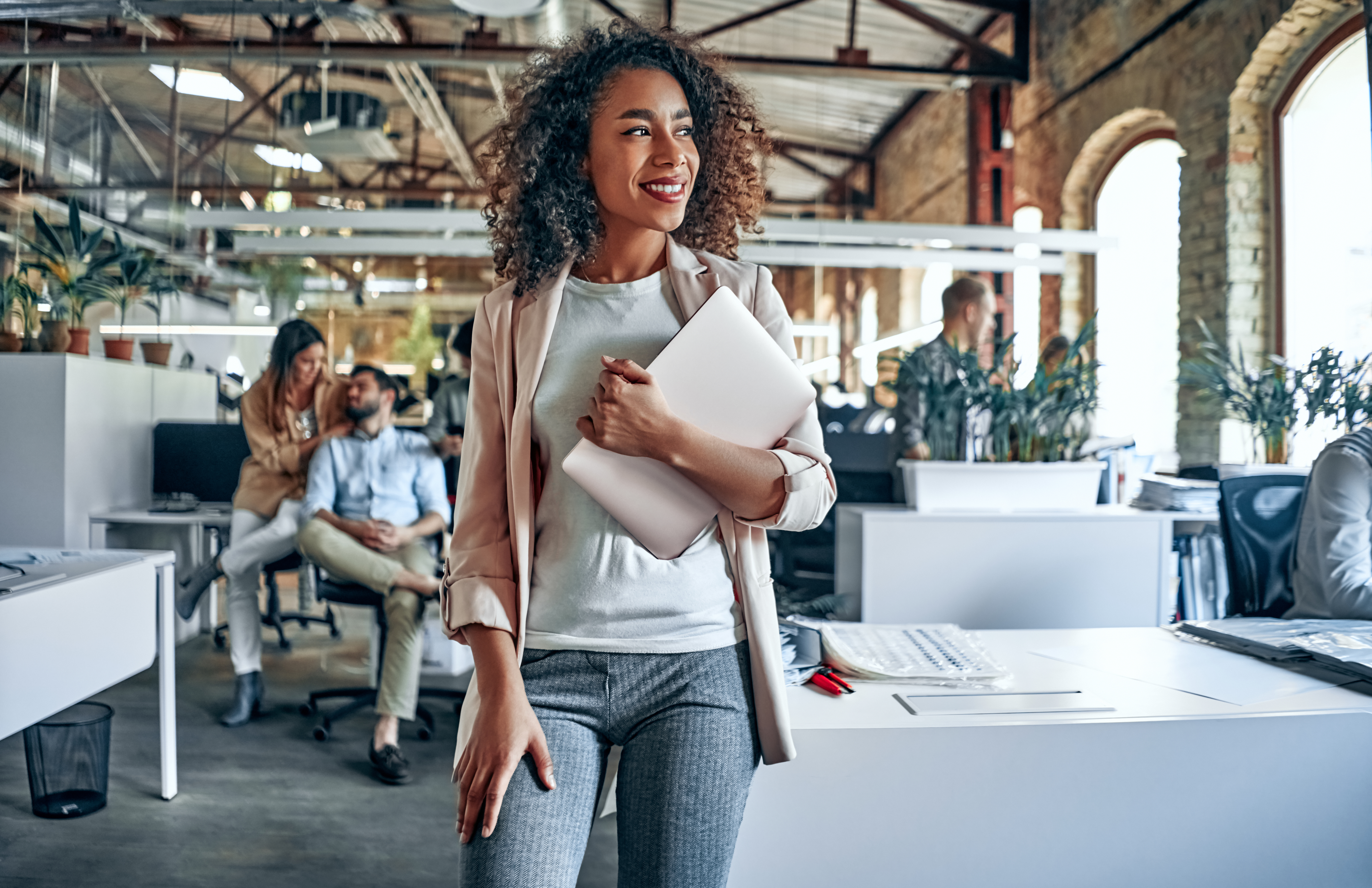 Woman carrying laptop